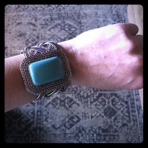 Turquoise bracelet with silver tone detail